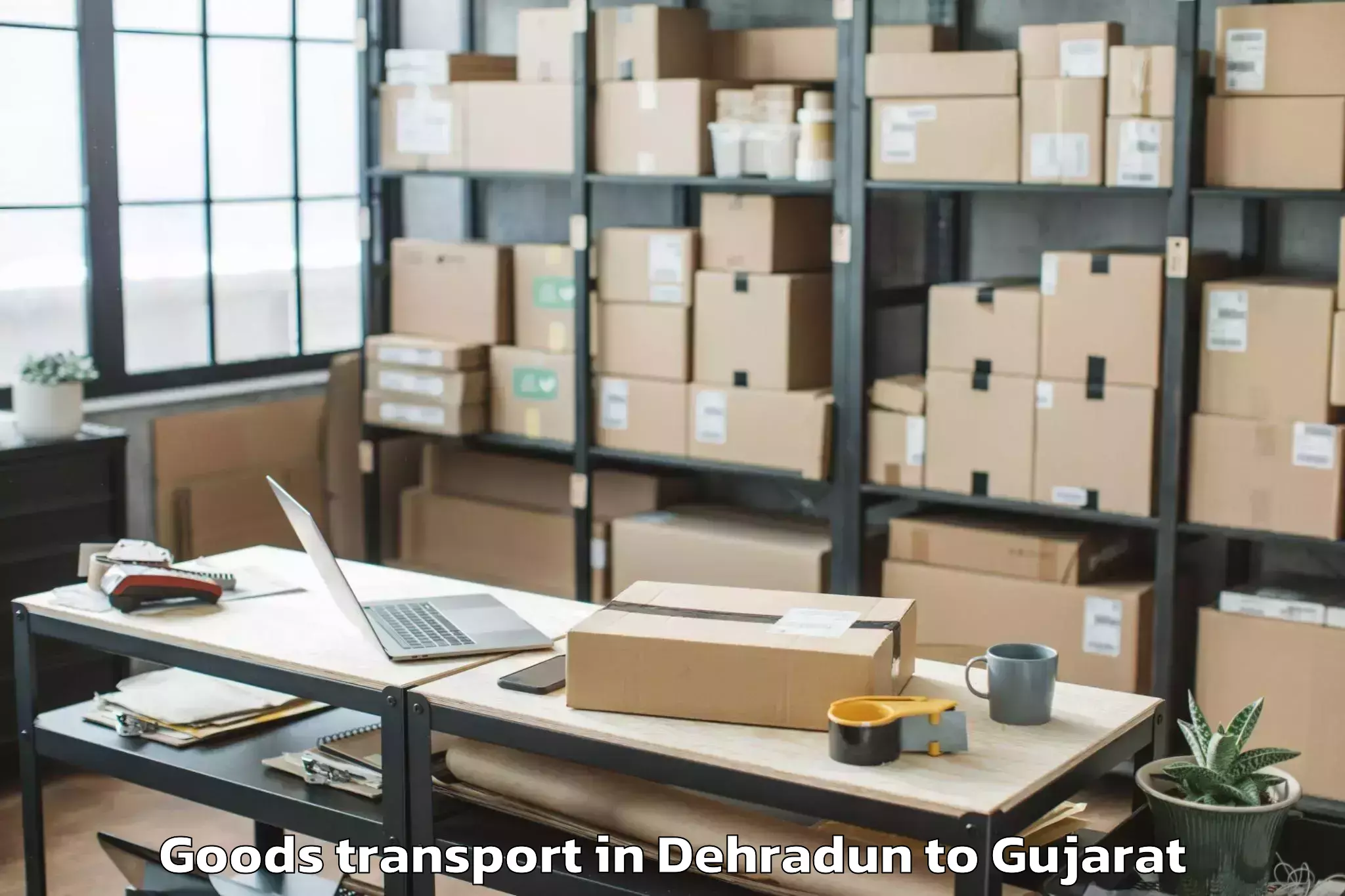 Professional Dehradun to Jafrabad Goods Transport